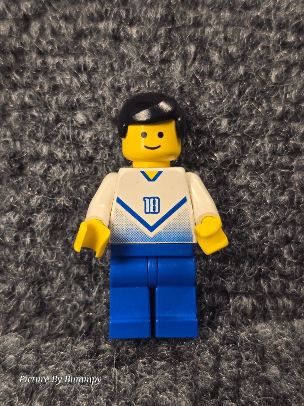 LEGO minifigure is a soccer player from the 2002 Sports